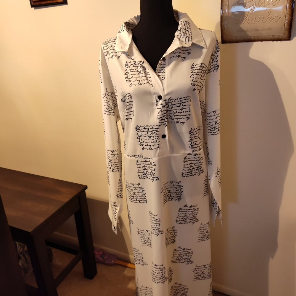 Women Long Maxi black and white with written pattern.